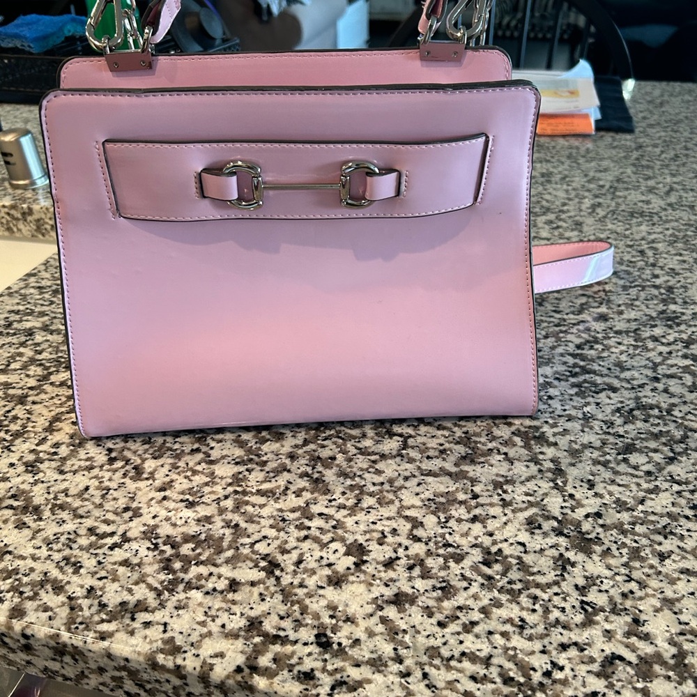 Steve Madden purse with long strap.. never been used.  Spotless